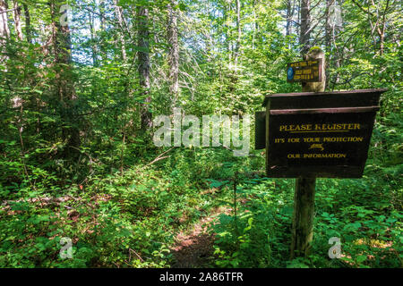 A check-in station and trail markers along the Northville Placid Trail Stock Photo