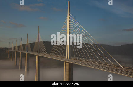 Panoramic view of the Millau Viaduct in morning mist, photographed from the Belvedère, France Stock Photo