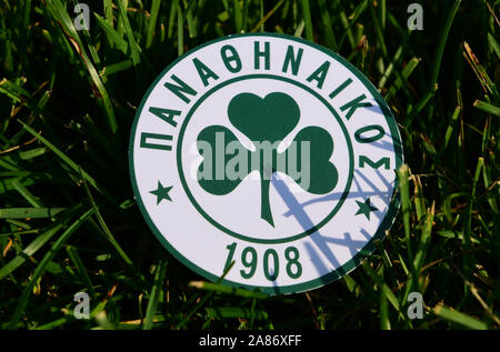 September 6, 2019 Istanbul, Turkey. The emblem of the Greek football club Panathinaikos Athens  on the green grass of the football field. Stock Photo