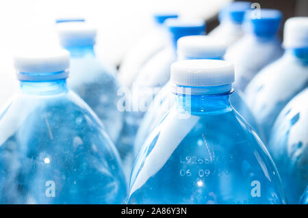 Recycling concept: empty blue water plastic bottle on white background Stock Photo