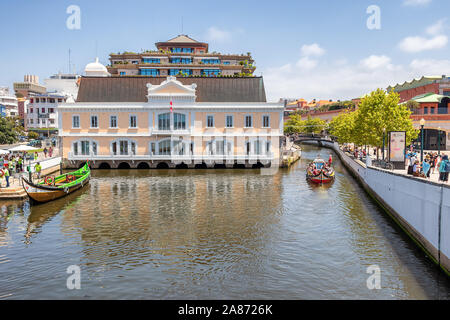 ourists traveling in a Moliceiro, Traditional boats in Aveiro, Portugal Stock Photo