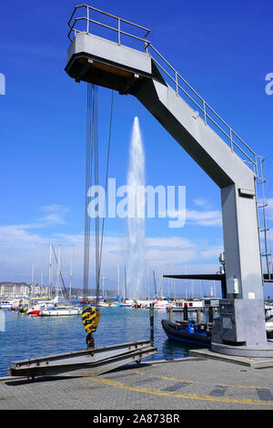 GENEVA, SWITZERLAND -6 APR 2019- View of the Jet d’Eau fountain, the most famous landmark in Geneva, Switzerland. It is located where the Rhone River Stock Photo