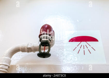 Water spray sprinkler to extinguish fires. Stock Photo