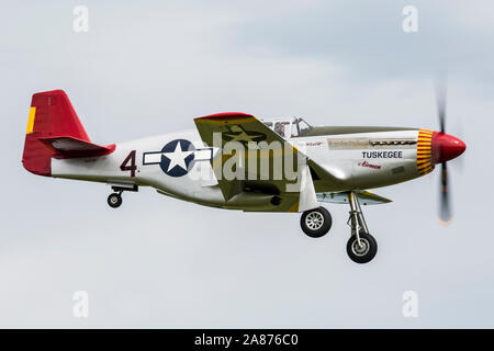 VANDALIA, OHIO / USA - JUNE 23, 2018: A World War II era P-51 Mustang from the 'Red Tails' squadron performing at the 2018 Vectren Dayton Airshow. Stock Photo