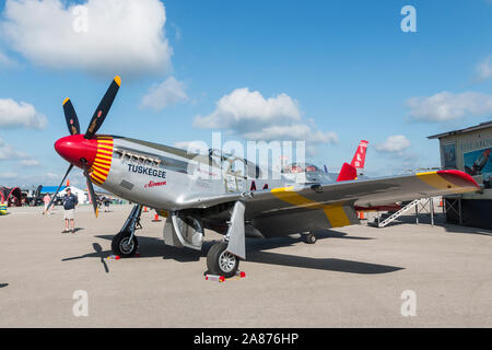 VANDALIA, OHIO / USA - JUNE 23, 2018: A World War II era P-51 Mustang from the 'Red Tails' squadron performing at the 2018 Vectren Dayton Airshow. Stock Photo