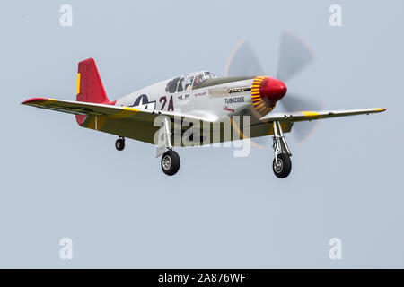 VANDALIA, OHIO / USA - JUNE 23, 2018: A World War II era P-51 Mustang from the 'Red Tails' squadron performing at the 2018 Vectren Dayton Airshow. Stock Photo