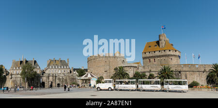 Saint-Malo, Ille-et-Vilaine / France - 19 August 2019: tourist sightseeing train waits for passengers outside the city walls of the old town of Saint- Stock Photo