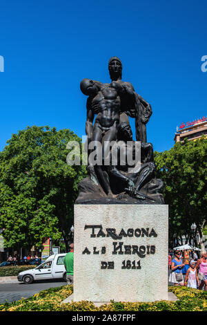 Tarragona, Spain-August 9, 2013: monument to the heroes of 1811 on Rambla Nova, Catalonia. Attractions In Catalonia. Monument of human figures. Stock Photo