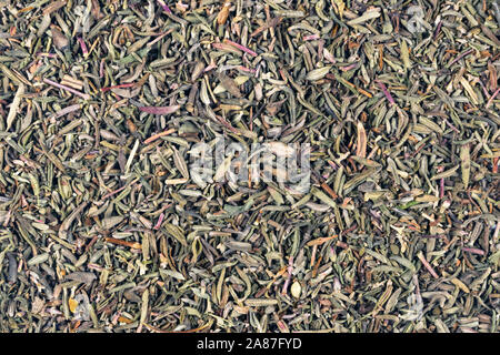 Dried thyme leaves background close up. Background of thyme. Organic herbs. Thyme plant close-up Stock Photo