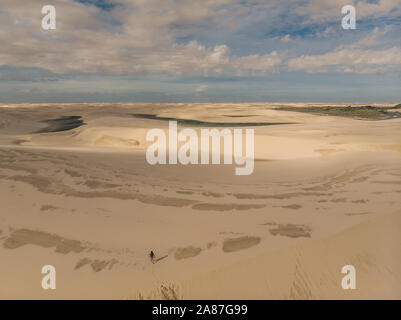 Aerial shot of the sand dunes and lagoons in Brazil, Lencois Maranhenses national park in Maranhao state.Lago azul Stock Photo