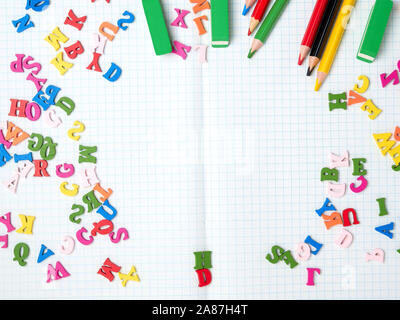blank white sheet of squared papers and school supplies, back to school, flat lay Stock Photo