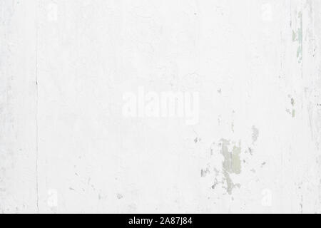 White grunge rusty painted urban texture on wood background Stock Photo