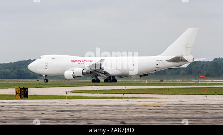 YPSILANTI, MICHIGAN / USA - August 25, 2018: A Boeing 747 owned by Kalitta Air performs a flyby at the 2018 Thunder Over Michigan Airshow.
