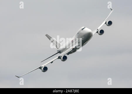 YPSILANTI, MICHIGAN / USA - August 25, 2018: A Boeing 747 owned by Kalitta Air performs a flyby at the 2018 Thunder Over Michigan Airshow.