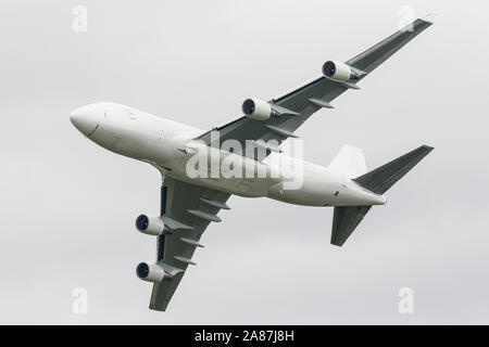 YPSILANTI, MICHIGAN / USA - August 25, 2018: A Boeing 747 owned by Kalitta Air performs a flyby at the 2018 Thunder Over Michigan Airshow.