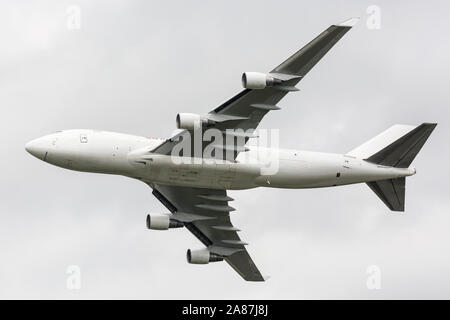 YPSILANTI, MICHIGAN / USA - August 25, 2018: A Boeing 747 owned by Kalitta Air performs a flyby at the 2018 Thunder Over Michigan Airshow.