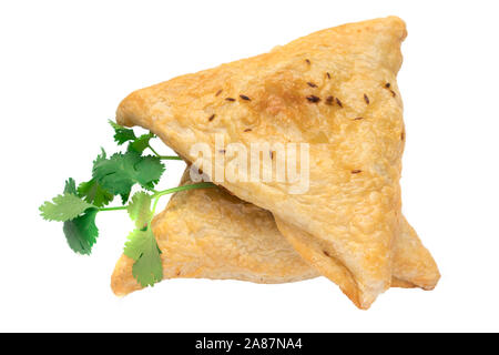 Triangular meat pie isolated on a white background. Stock Photo