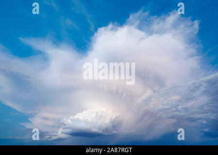 Cloudy stormy dramatic sky with lightning strike. Thunder cloudscape. Meteorology Stock Photo