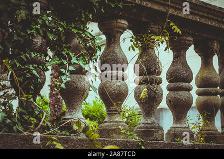 Balusters made of stone on the old historic staircase Stock Photo
