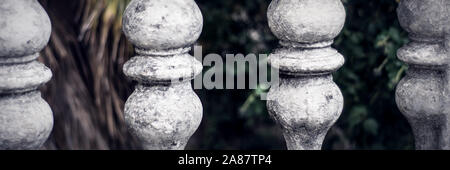 Balusters made of stone on the old historic staircase Stock Photo