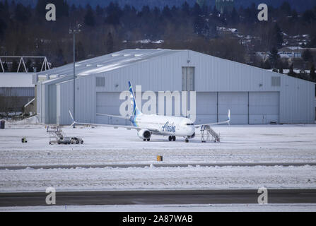 Portland, Oregon / USA February 2019: An Alaska Airlines Boeing 737NG aircraft parked at a remote parking location at Portland International Airport ( Stock Photo