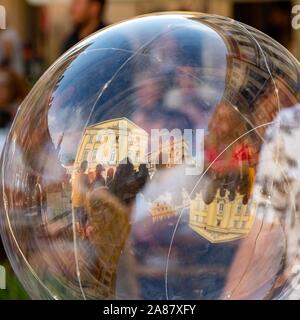 Reflection of old houses in soap bubble, Lublin, Poland Stock Photo