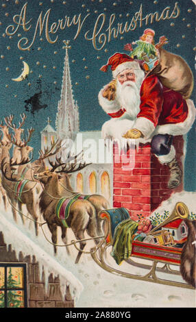 A colorfulvintage merry Christmas card with Santa on his way down the chimney on a snowy night, complete with reindeer sack of gifts and sled, used in New York USA ca 1910 Stock Photo