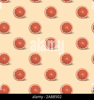 Seamless pattern with grapefruit on a pale light pink background. Stock Photo