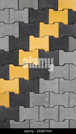 Concrete or cobble gray pavement slabs or stones for floor, wall or path. Traditional fence, court, backyard or road paving. Brick Stone Pavement for Stock Photo