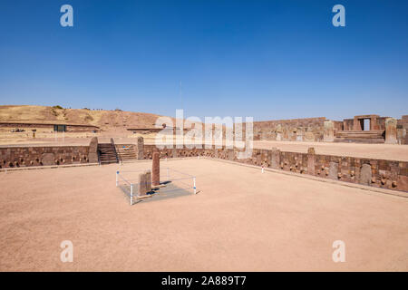Scenic view of the Semi-underground Temple with the Akapana pyramid in the background at Tiwanaku Archeological Complex, Bolivia Stock Photo