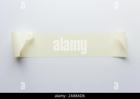 white adhesive tape on white background. close up shot. top view. Stock Photo
