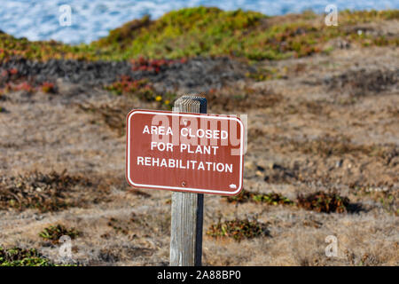 “Area closed for plant rehabilitation” sign, Cambria on the Pacific Coast Highway, SR1, California, United States of America Stock Photo