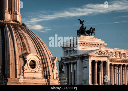 A view over the rooftops of Rome, Italy, with the Altare della Patria, aka the  Monumento Nazionale a Vittorio Emanuele in the background. Stock Photo
