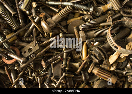 rusty bolts and nuts tools on background Stock Photo