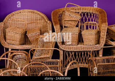 Some wicker storage baskets and chairs Stock Photo