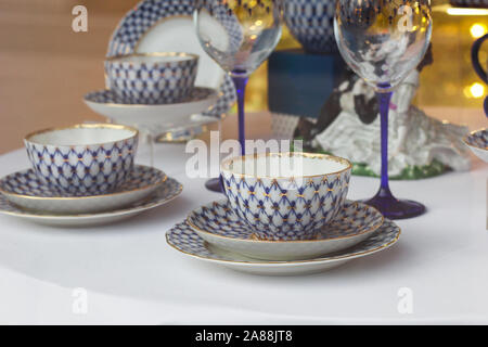 ceramic cup and saucer with a pattern. decor teapots Stock Photo