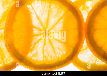 Orange slices back lighting. Stock Photo