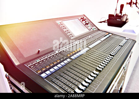 Digital professional audio mixing console in store Stock Photo