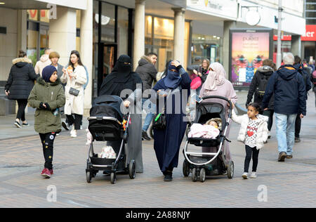 Many generations of Muslim women, out shopping. Stock Photo