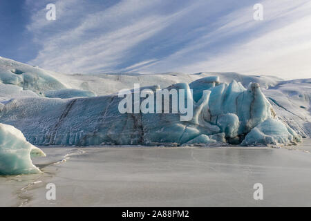 Aerial view of the Sv nafellsj kull glacier in sunny weather. The beginning of spring in Iceland. Stock Photo
