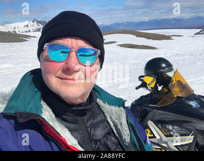Photographer on a glacial expedition on Vatnajokull, Vatnajokull National Park, Iceland. Unesco World Heritage Site. Stock Photo
