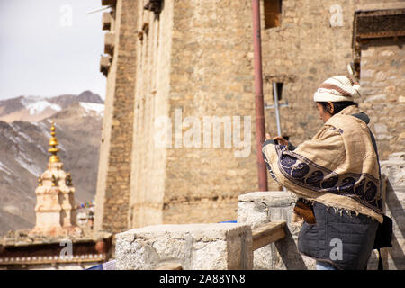 Travelers thai women people travel visit and take photo view landscape of Leh Ladakh Village from viewpoint of Leh Stok Palace at Jammu and Kashmir, I Stock Photo