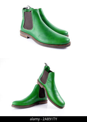 Male green leather boot on white background, isolated product. Stock Photo