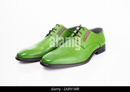 Male green leather shoe on white background, isolated product. Stock Photo