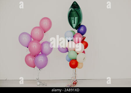 colorful balloons on holiday nice white interrior Stock Photo