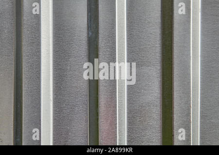 Abandoned old corrugated galvanised iron roofing sheet, abstract background of metal texture. Stock Photo