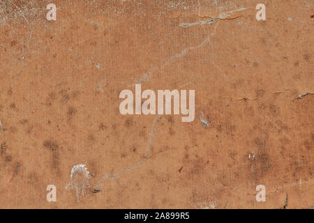 Rusty sheet of metal with faded paint abstract texture for backdrop or background. Stock Photo