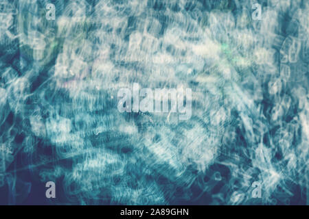 Deep blue abstract background. Background with the image of streaks of white smoke on a blue background. Stock Photo