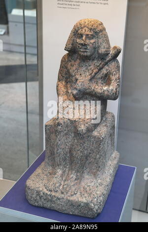 Granite statue of Ankhwa at the British Museum in London, UK Stock Photo