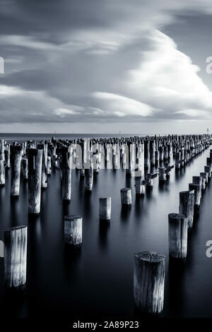 4 Nov 19. Melbourne, Australia. Original pylons, circa 1912 of Princess Pier in Port Melbourne, Victoria. Stock Photo